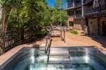 Experience ultimate relaxation in this stunning outdoor oasis, featuring a luxurious stainless steel hot tub perfect for unwinding.