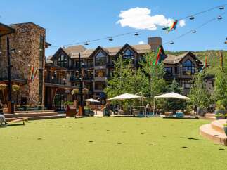 Experience outdoor living at its finest with this spacious green lawn area, perfect for recreation and relaxation.