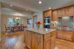 Experience elegant dining and gourmet cooking in this stunning kitchen and dining area.