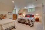 This charming bedroom features two comfortable beds, perfect for accommodating family or guests.