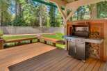 Enjoy outdoor living with this spacious deck and built-in grill station, perfect for entertaining.