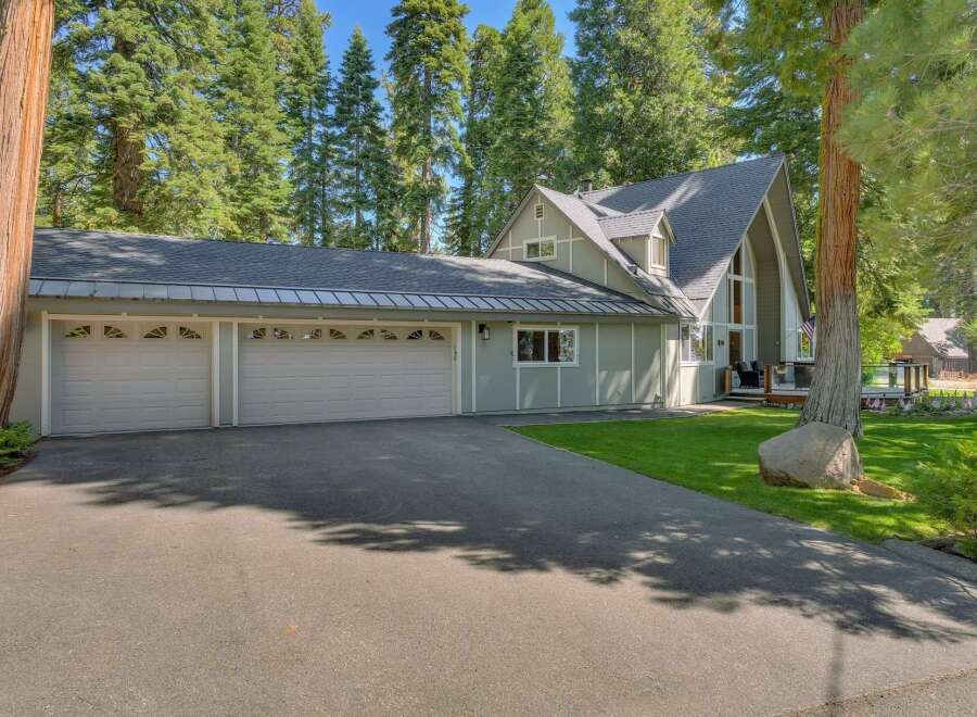 This stunning property boasts a spacious three-car garage, perfect for vehicle storage and hobbies.