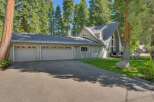 This stunning property boasts a spacious three-car garage, perfect for vehicle storage and hobbies.