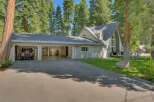 Discover this stunning property featuring a spacious multi-car garage with ample storage, perfect for vehicles and outdoor gear.