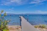 Enjoy breathtaking lake views from this stunning property featuring a private dock perfect for your boat.