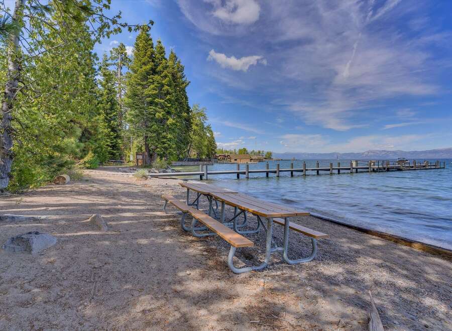 Enjoy lakeside living with this stunning property featuring a private dock perfect for boating and water activities.