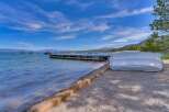 Enjoy lakeside living with this stunning property featuring a private dock perfect for your boats.