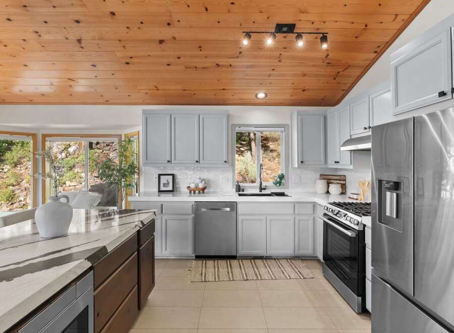 Experience the perfect blend of rustic charm and modern convenience in this stunning kitchen.