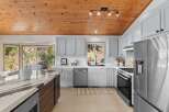 Experience the perfect blend of rustic charm and modern convenience in this stunning kitchen.