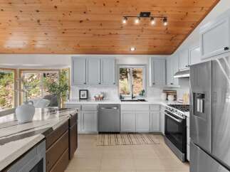 Experience the perfect blend of rustic charm and modern convenience in this stunning kitchen.