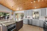 Experience the perfect blend of rustic charm and modern convenience in this stunning kitchen.