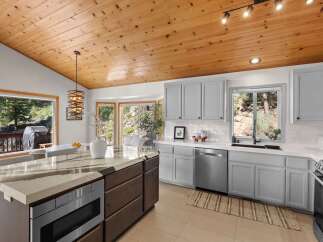 Experience the perfect blend of rustic charm and modern convenience in this stunning kitchen.