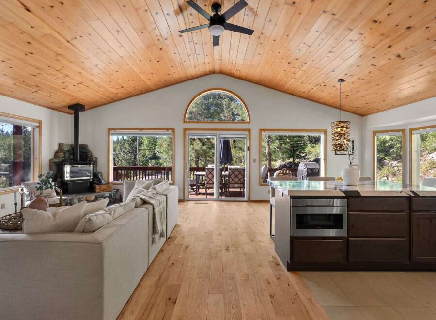 Experience rustic charm and modern comfort in this stunning mountain home.