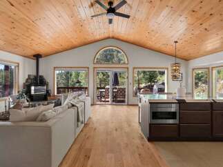 Experience rustic charm and modern comfort in this stunning mountain home.