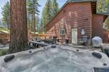 Relax and unwind in this inviting backyard oasis, complete with a bubbling hot tub perfect for soaking under the stars.