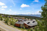 Discover mountain living at its finest with these stunning properties nestled amidst a lush evergreen forest.