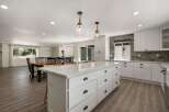 Experience spacious open-concept living in this beautifully renovated kitchen and dining area.