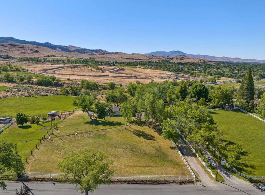 Discover this expansive property offering a serene rural lifestyle with stunning mountain views.