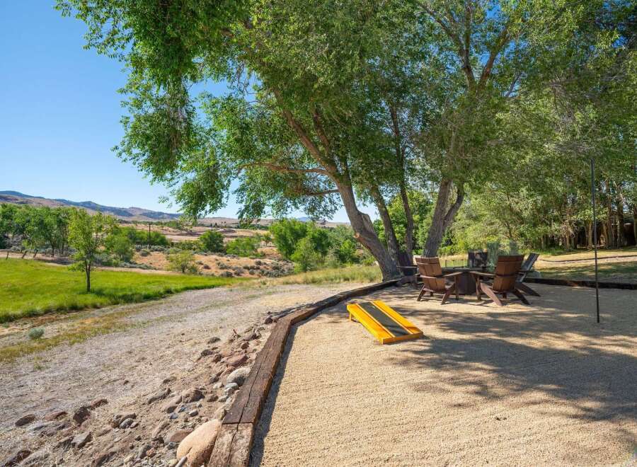 Enjoy outdoor living at its finest with this charming patio area, perfect for relaxation and entertainment.