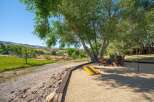Enjoy outdoor living at its finest with this charming patio area, perfect for relaxation and entertainment.