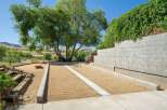 Enjoy outdoor recreation with this dedicated bocce ball court, perfect for friendly competition.