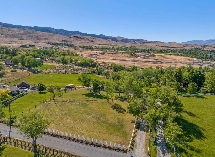 Discover this expansive rural property offering a serene lifestyle with ample space for outdoor activities and potential development.