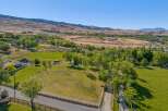 Discover this expansive rural property offering a serene lifestyle with ample space for outdoor activities and potential development.