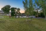 Discover this charming ranch-style home nestled on a sprawling property, perfect for outdoor enthusiasts.
