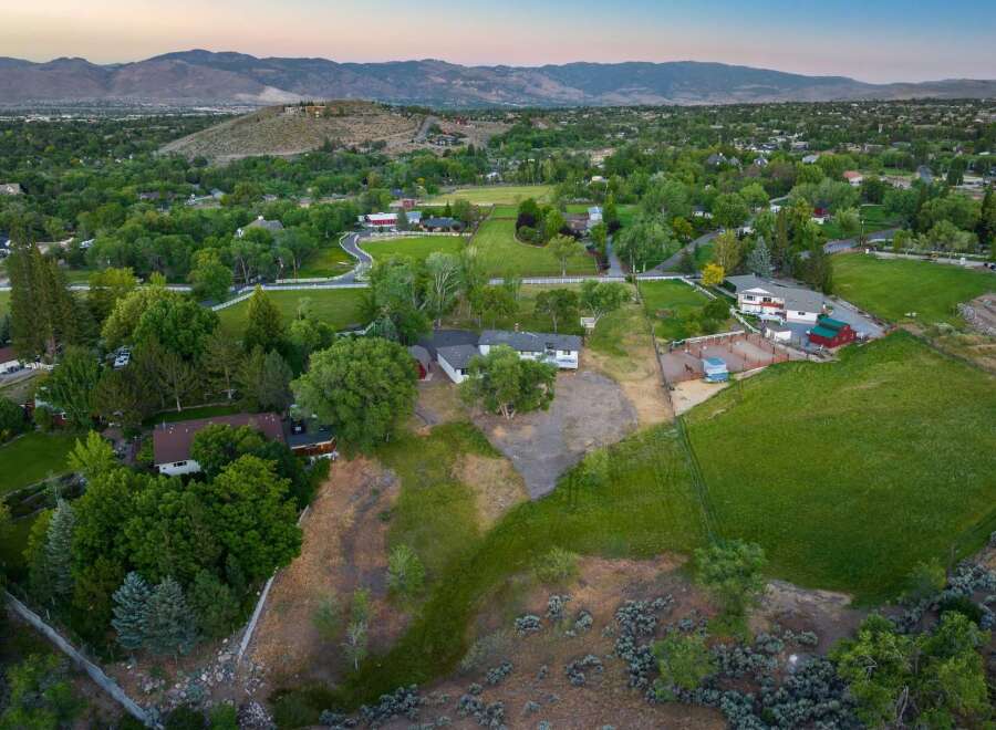 Discover this expansive property offering a serene rural lifestyle with stunning mountain views.