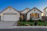 Discover this charming single-story home featuring a stucco exterior and a welcoming facade.
