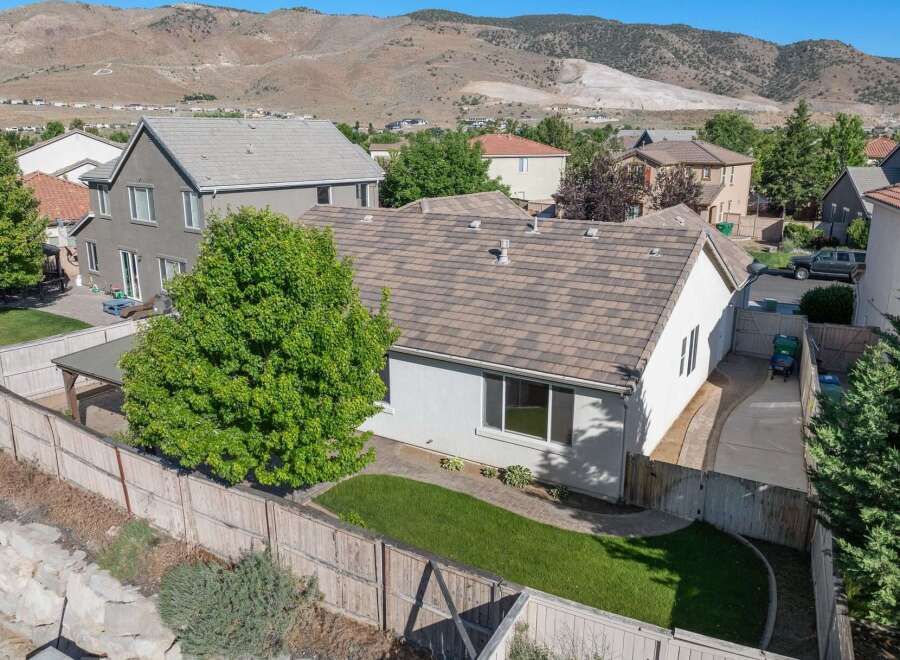 Discover this charming home with a spacious backyard, perfect for outdoor entertaining.