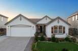 Charming single-family home featuring a stucco exterior and a tile roof.