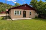 Charming single-family home nestled in a serene, natural setting.