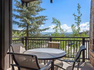 Enjoy breathtaking mountain views from this charming balcony, perfect for morning coffee or evening relaxation.