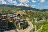 Discover this stunning mountain resort community, featuring modern architecture nestled amidst lush greenery and scenic mountain vistas.