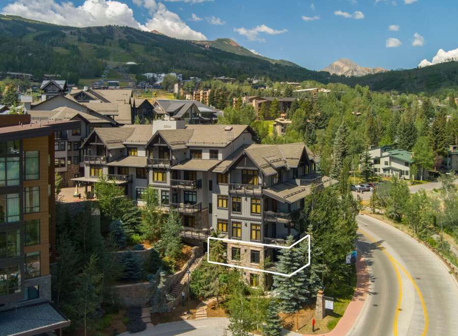 Experience luxury mountain living in this stunning property, nestled amidst lush greenery and offering breathtaking views of the surrounding peaks.