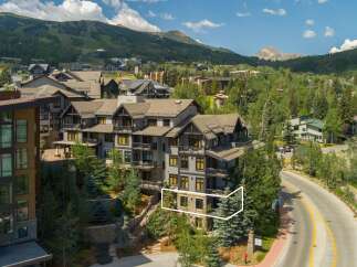 Experience luxury mountain living in this stunning property, nestled amidst lush greenery and offering breathtaking views of the surrounding peaks.