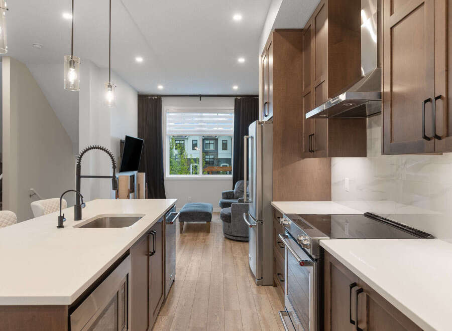 Experience modern living in this stunning kitchen and living area.