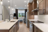Experience modern living in this stunning kitchen and living area.