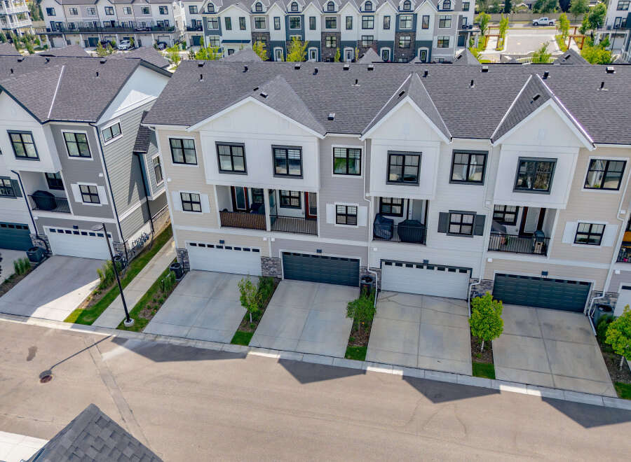 Discover modern townhome living with this stunning aerial view.