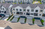 Discover modern townhome living with this stunning aerial view.