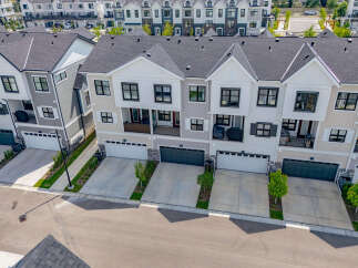 Discover modern townhome living with this stunning aerial view.