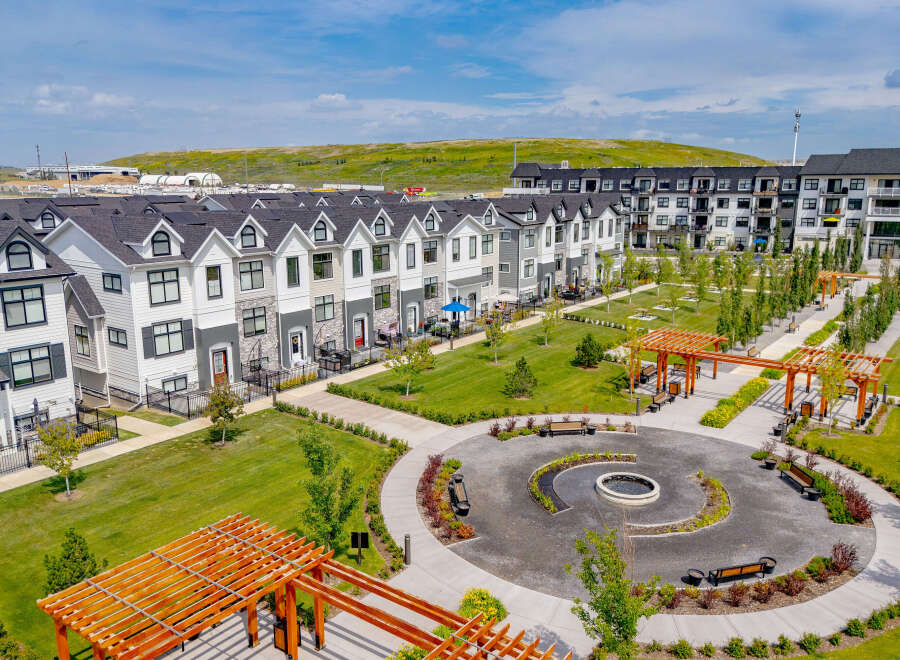 Discover modern living in this vibrant community featuring stylish townhomes and apartment buildings.
