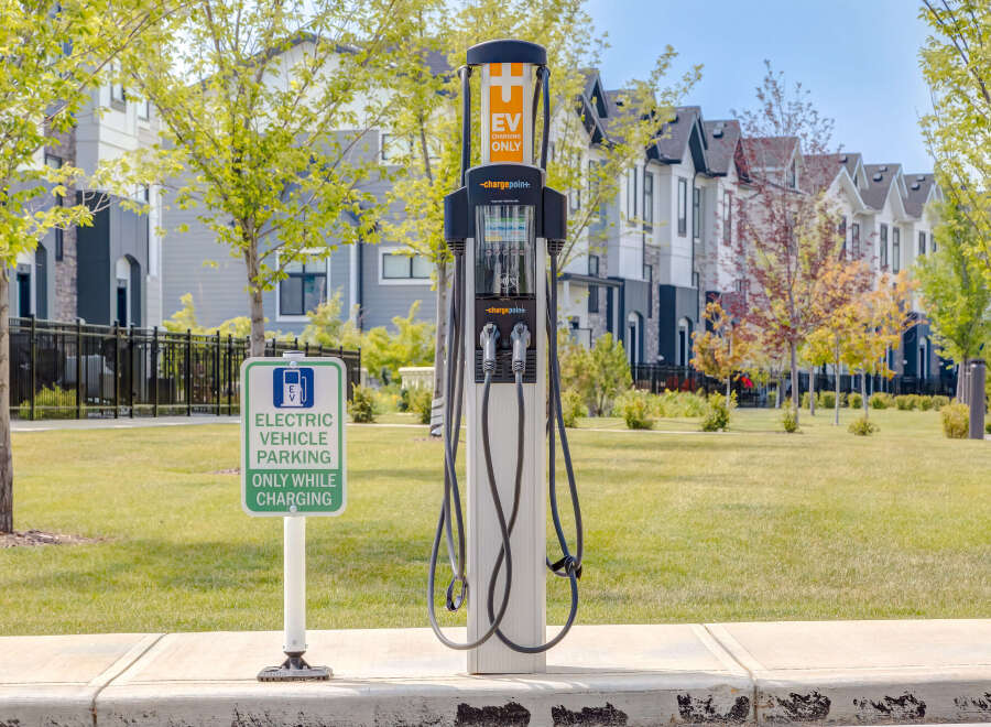 Discover modern living with convenient electric vehicle charging stations right outside your door.