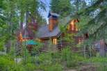 Nestled amidst lush greenery, this charming log cabin offers a serene retreat.