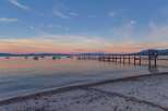 Experience serene lakefront living with this stunning property, featuring a private dock perfect for your boats and watercraft.