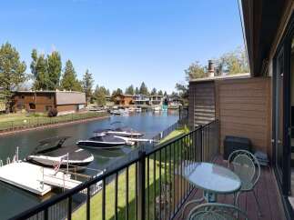 Enjoy waterfront living with this stunning property featuring a private dock and direct canal access.