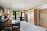 Enjoy waterfront living with this charming studio featuring a murphy bed for space-saving convenience.