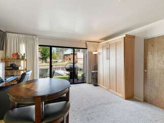 Enjoy waterfront living with this charming studio featuring a murphy bed for space-saving convenience.