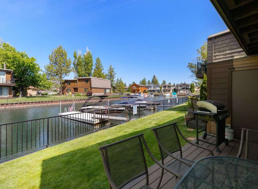 Enjoy waterfront living with your own private dock and boat slip, perfect for water enthusiasts.